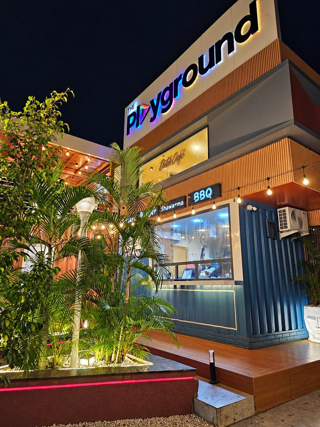 The Playground, Warri — frontage at night