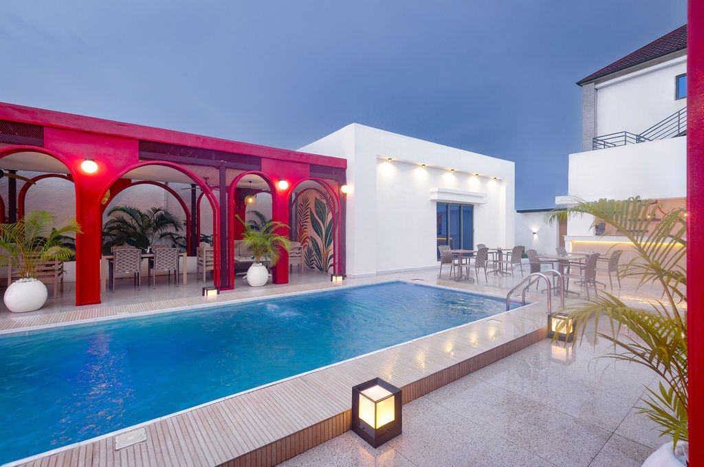 Ivy Lush Hotel, Warri — Pool at dusk